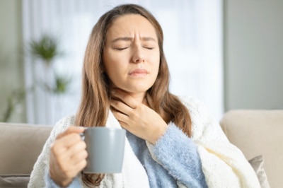 woman with sore throat