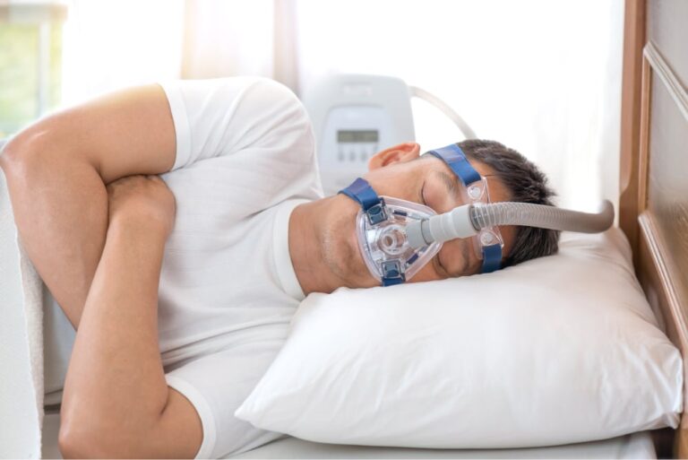 man sleeping with mask