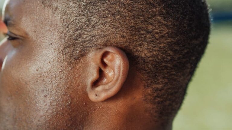 Close up of a man's ear.