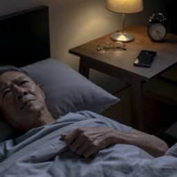 Man lying awake at night