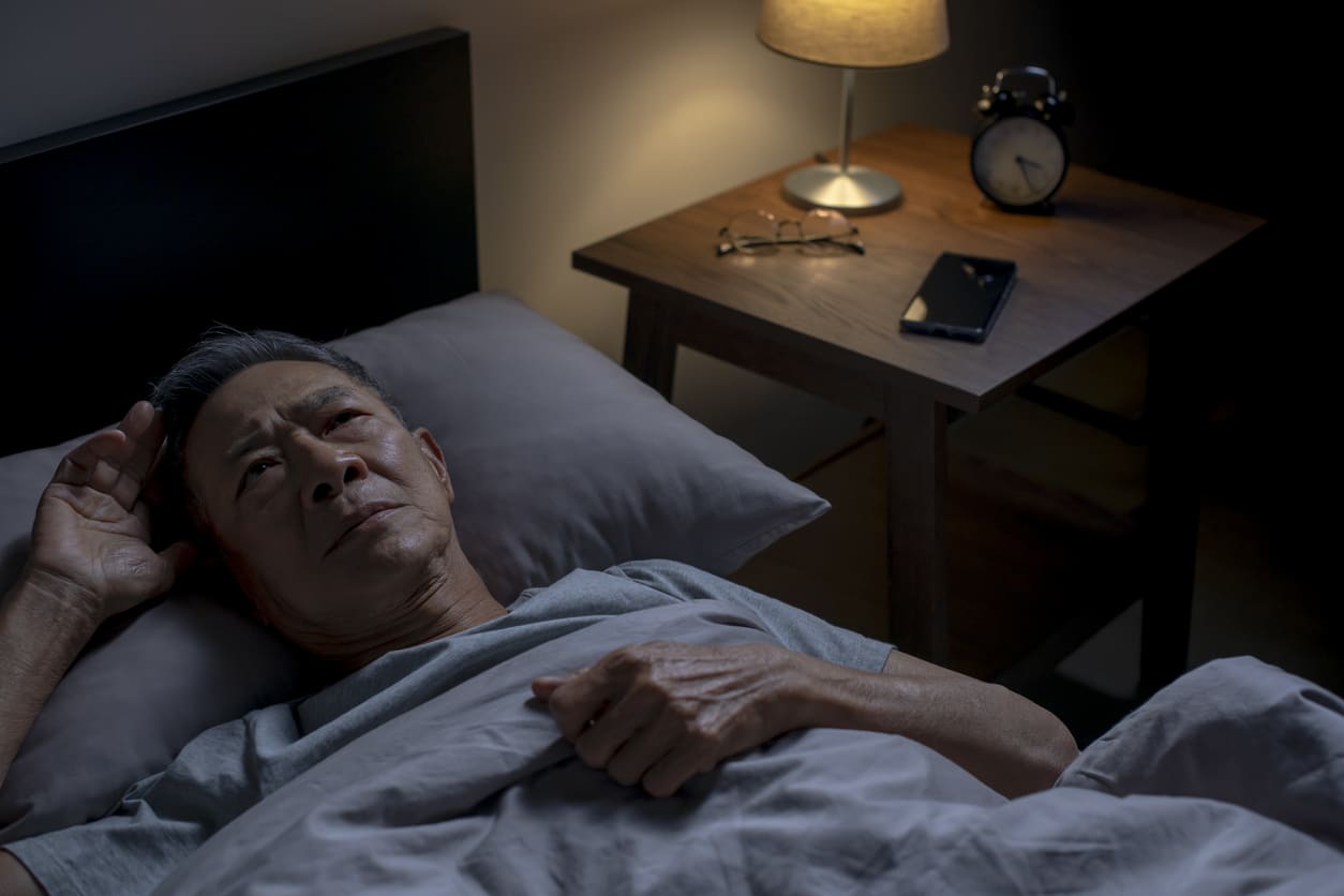 Man lying awake at nights.